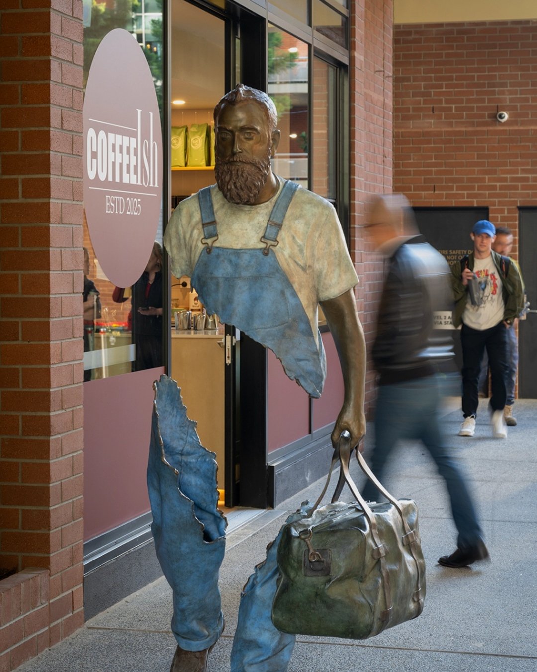 If you're in Fish Lane, stop for a selfie with Raphael the Traveller. It's a laneway landmark and a great photo moment. Snap it, then keep strolling.
Art credit: Raphael the Traveler, 2024 by Bruno Catalano 📸