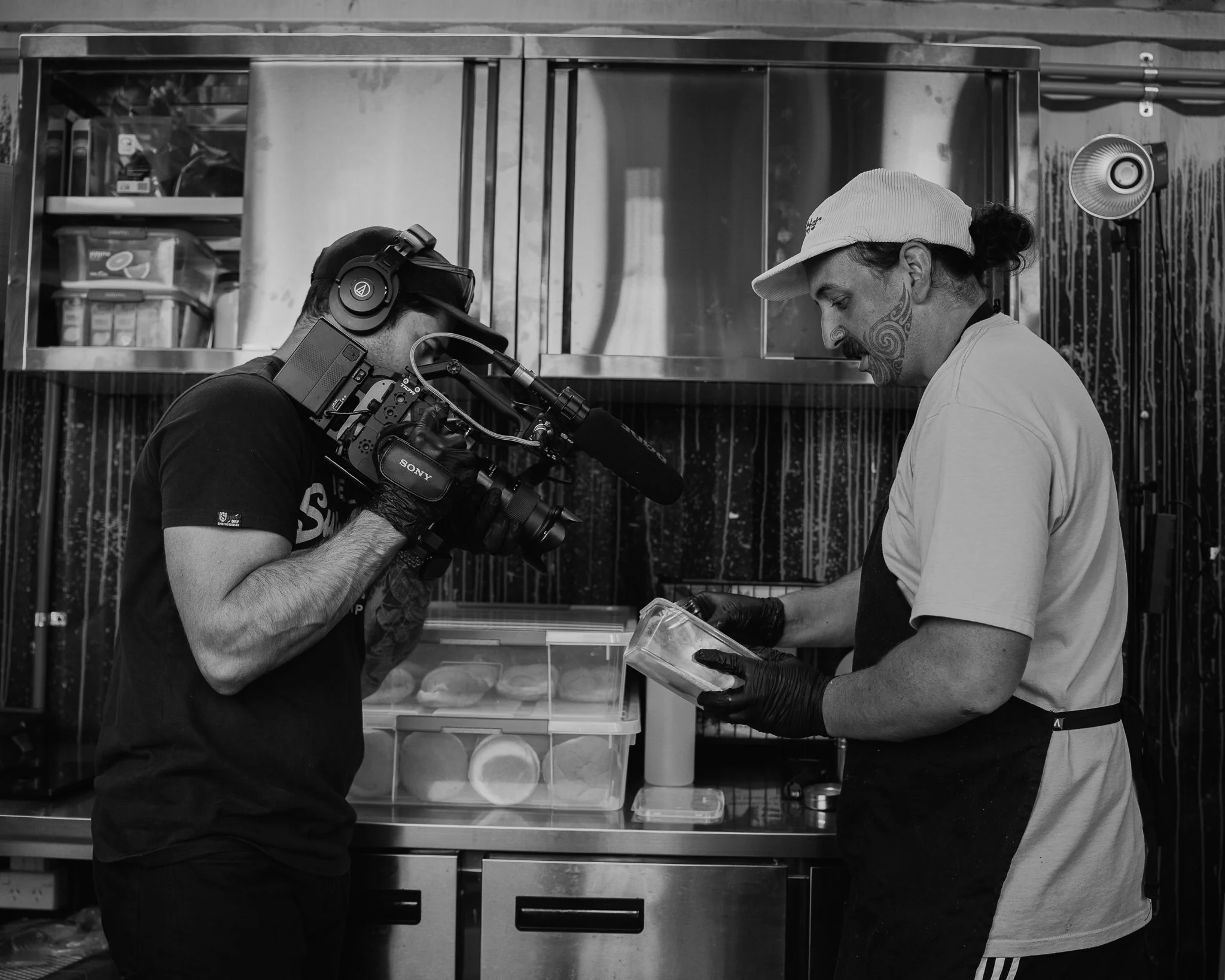Ben Moulson, owner of cornerstone media, in the act of filming a piece for a restaurant using the Sony FX6