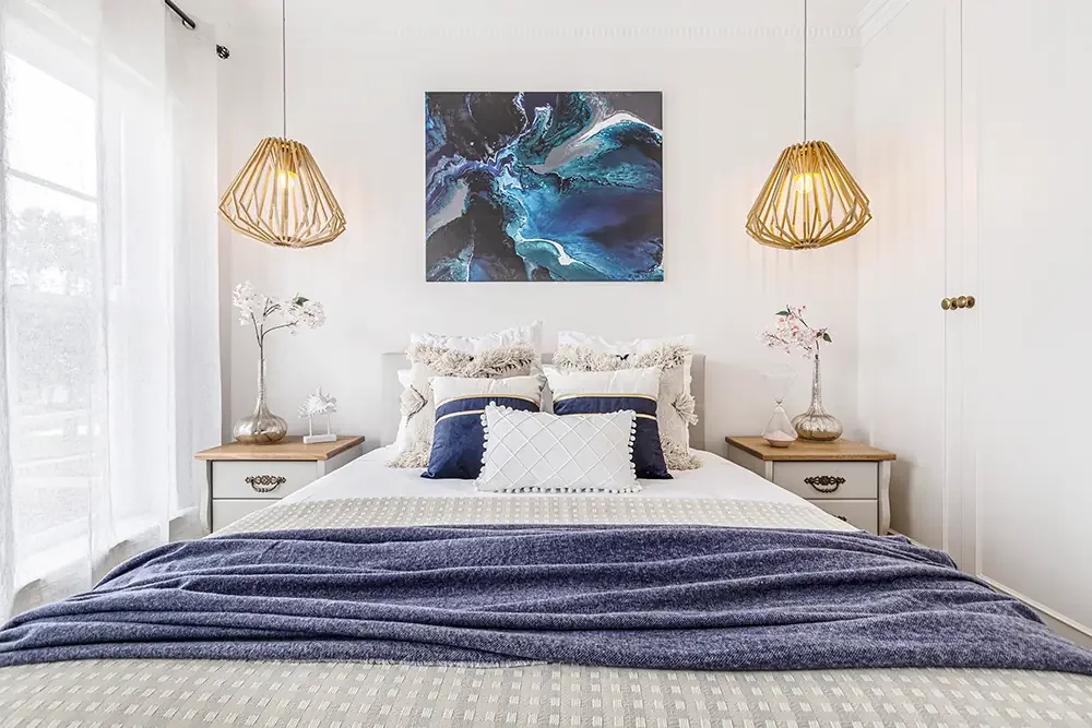 Clean and stylish Williamstown bedroom, highlighting high-quality architectural photography for property managers.