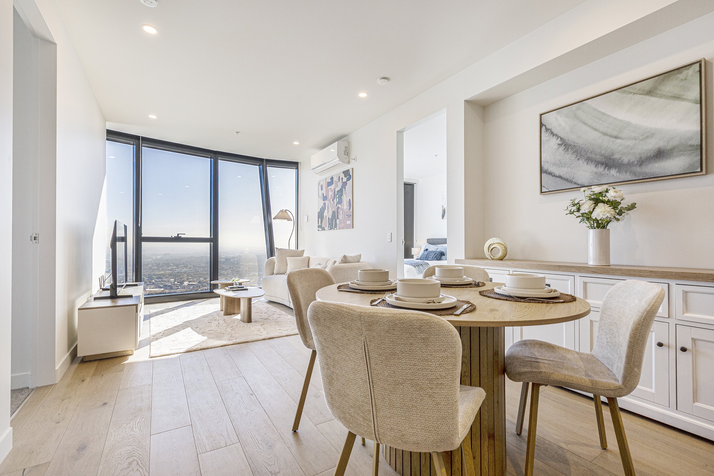 Melbourne CBD Airbnb photography showing a styled apartment with city skyline view