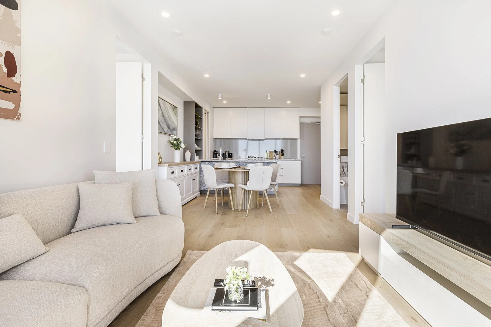 Interior of a modern, light filled Airbnb apartment in the Melbourne CBD. Photographed by Andrew Para Photography.