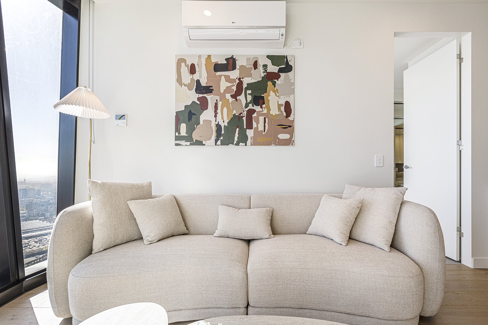 Modern furnishings and decor in a CBD Airbnb apartment.