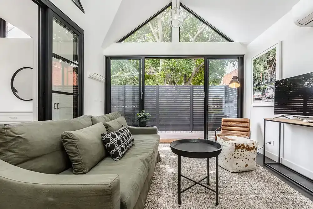 High-end short-term rental photography in Prahran, showcasing a sleek living space designed to attract guest bookings.