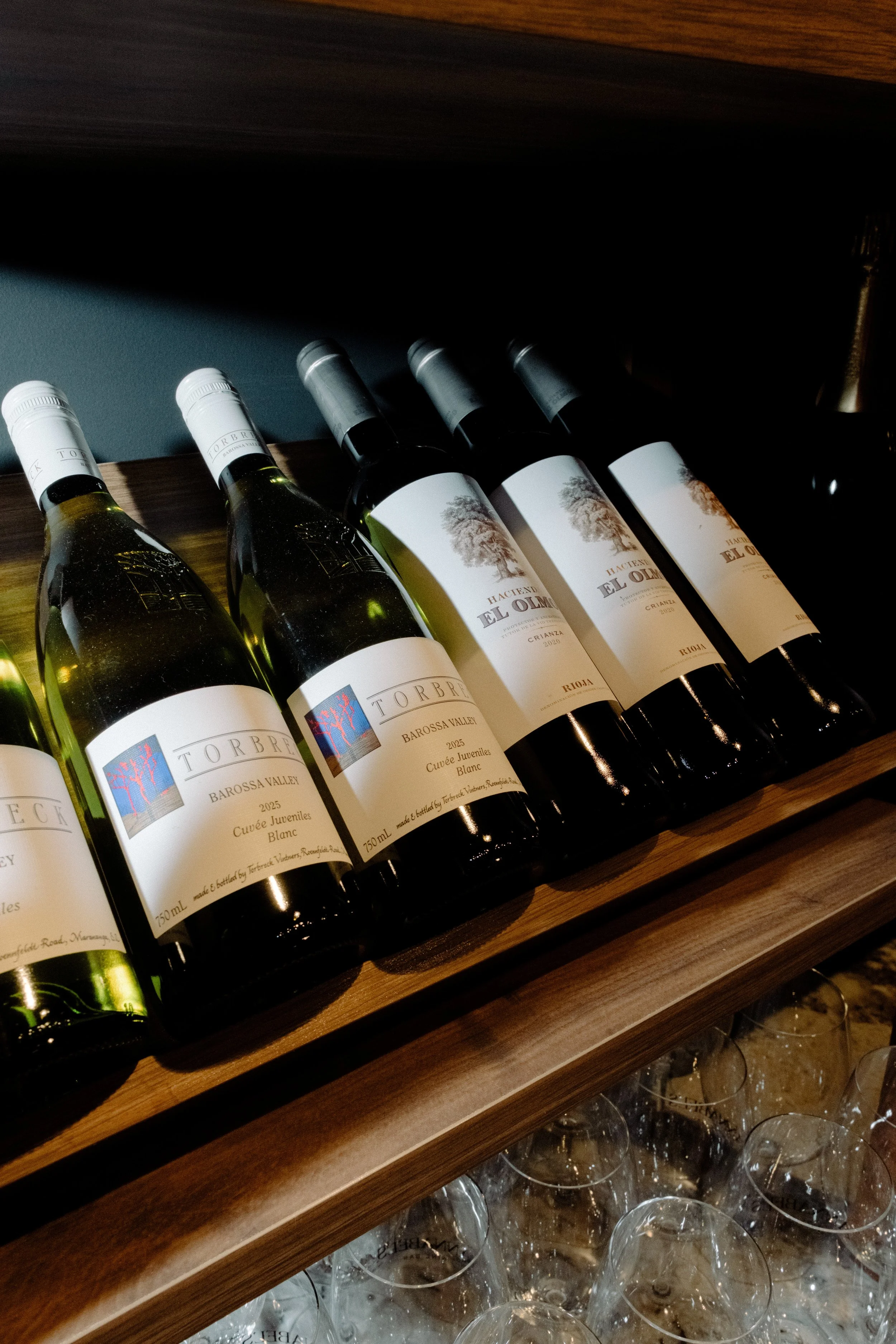 A shelf full of exclusive wine bottles at Annabel's WIne Bar