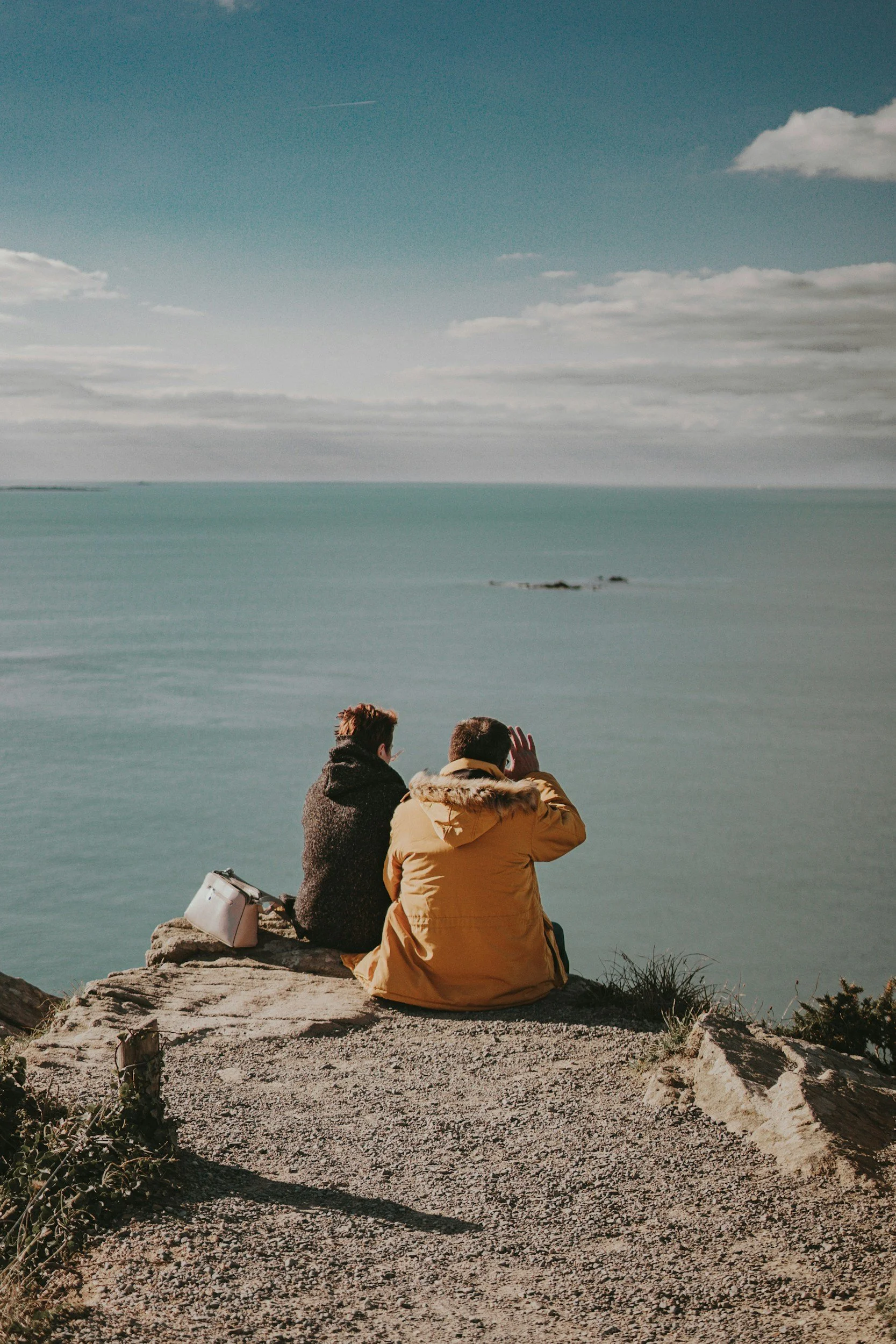 two people sitting together