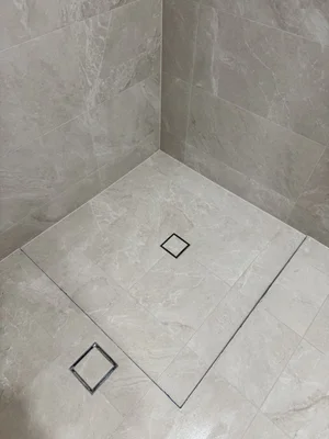 Large format shower tiling by Paiva Tiling Co