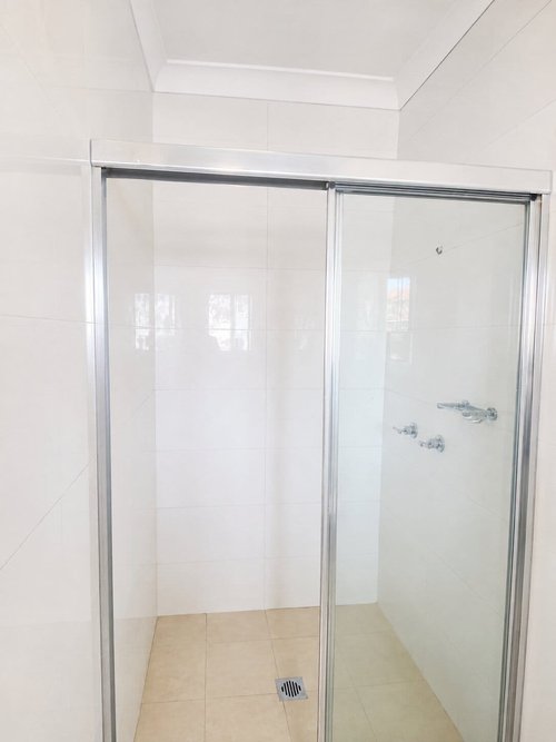 Completed bathroom floor tile repair