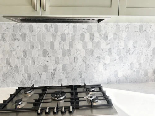 Marble mosaic kitchen splashback installed by Paiva Tiling Co