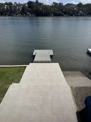 600x600 waterfront outdoor porcelain tiling by Paiva Tiling Co