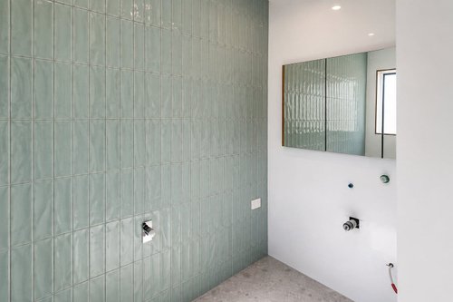 Vertical subway tile feature wall installation
