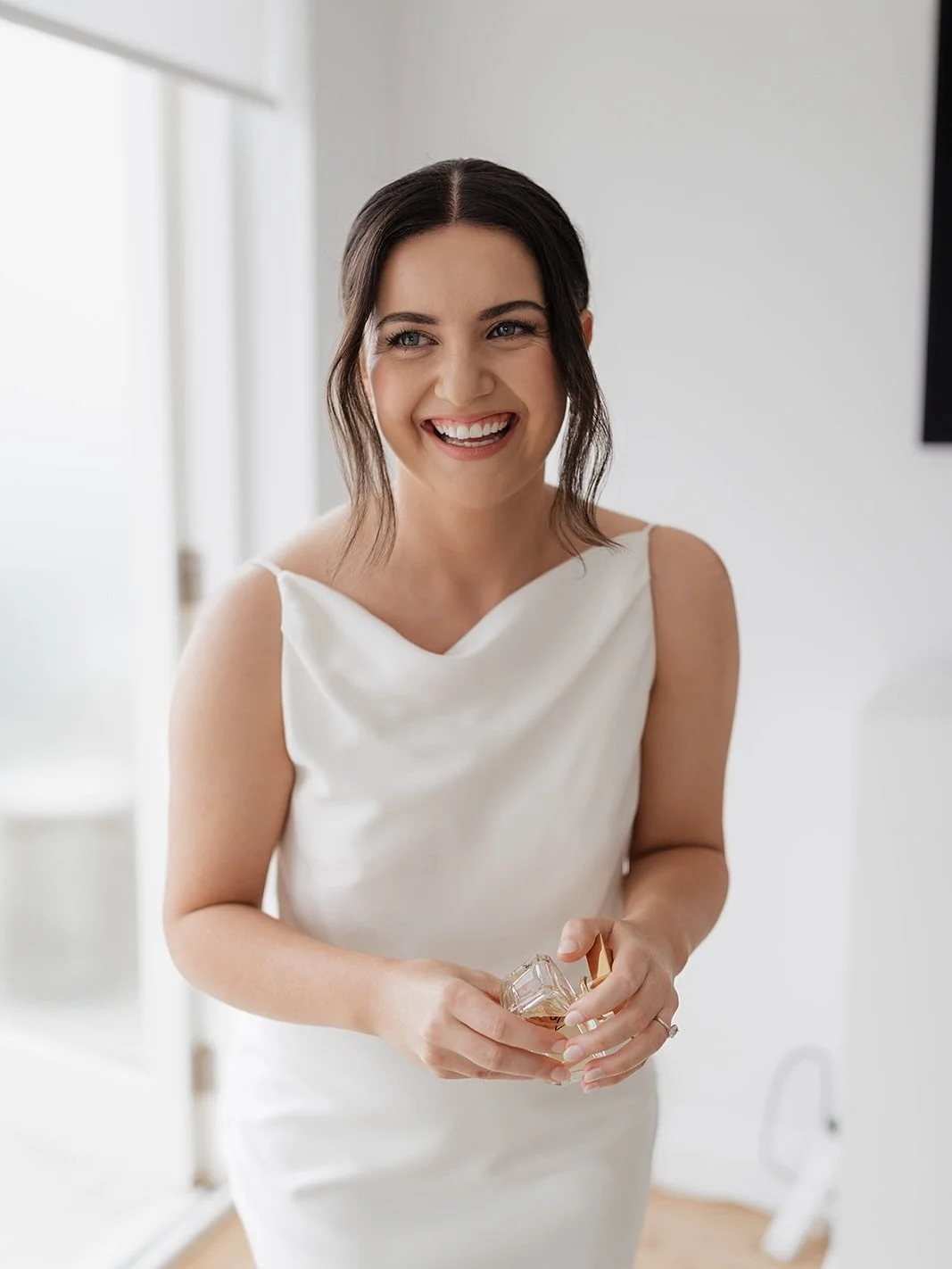 🌸 Bree 🌸
That smile and crystal blue eyes are so dazzling.
The polished bun with natural makeup that accentuates her beauty suits Bree and her dress perfectly. We just love seeing everything come together on the day. 
@azurephotography 
#naturalwed