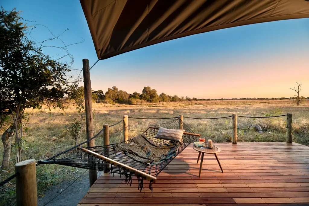 Hammock deck with floodplain views at Khwai Lediba Expeditions Camp, Okavango Delta