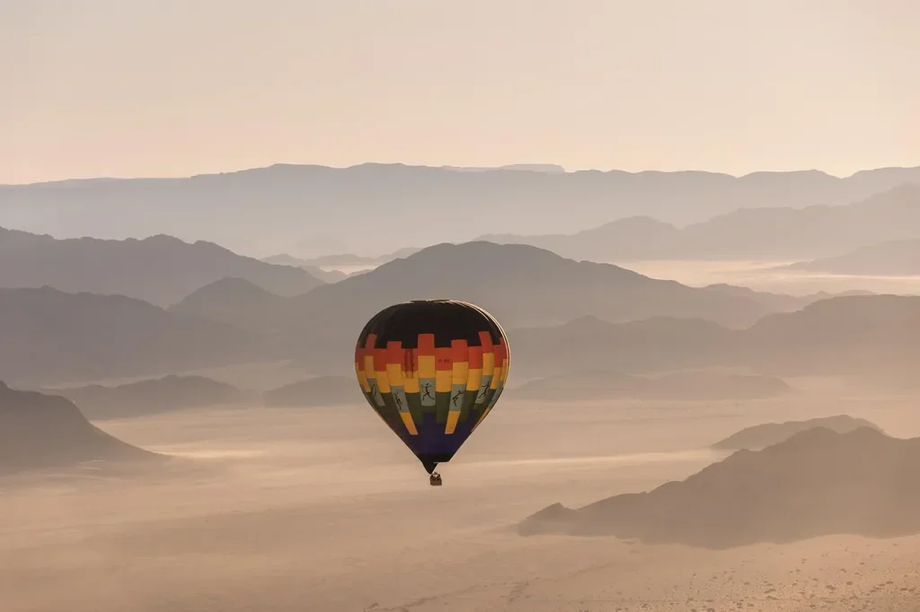 Hot air balloon over Sossusvlei mountains near Kulala Desert Lodge