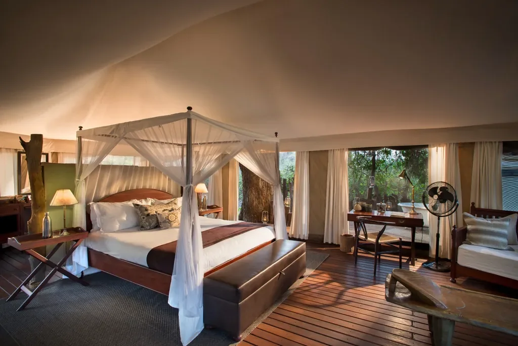 Luxury tented suite with four-poster bed at Kanga Expeditions Mana Pools Zimbabwe