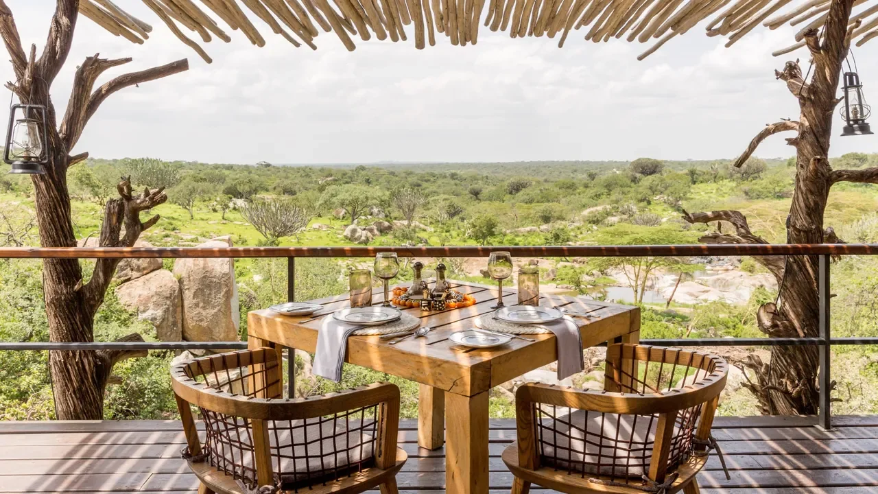 Breakfast table at Mwiba Lodge with panoramic river valley views in Tanzania