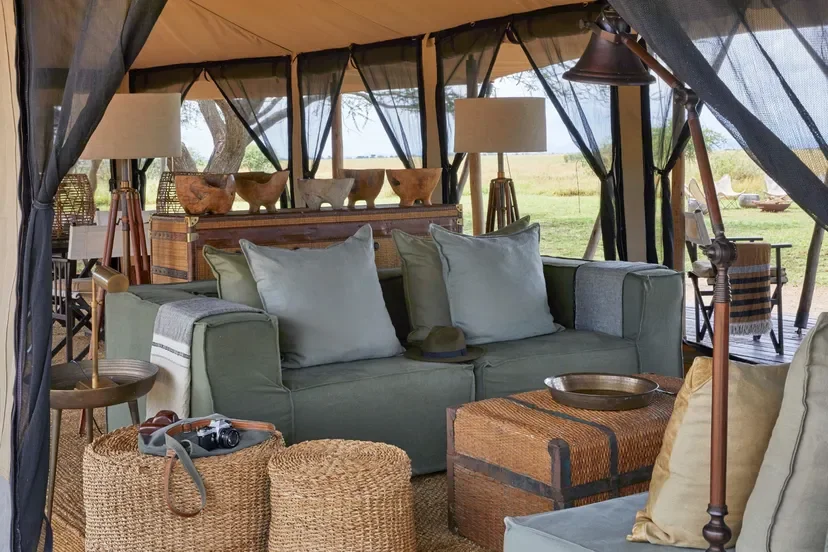 Mila Tented Camp lounge with safari chic sofas in the Serengeti