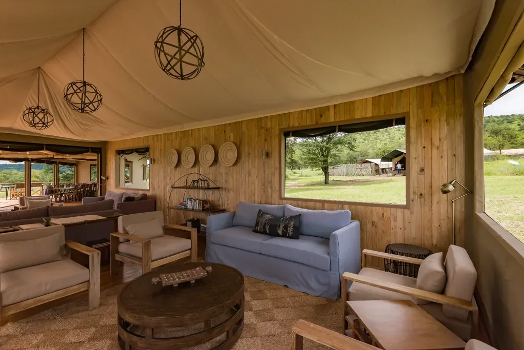 Dunia Camp new lounge interior with natural wood design and views over the Serengeti