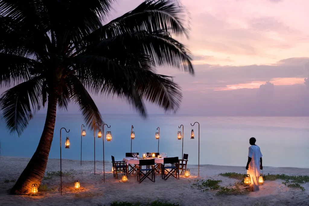 intimate beach dining under lanterns – andBeyond Benguerra Island, Mozambique