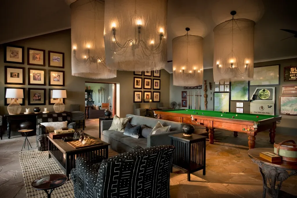 Bumi Hills Safari Lodge main lodge interior with billiards table and curated décor, Lake Kariba, Zimbabwe