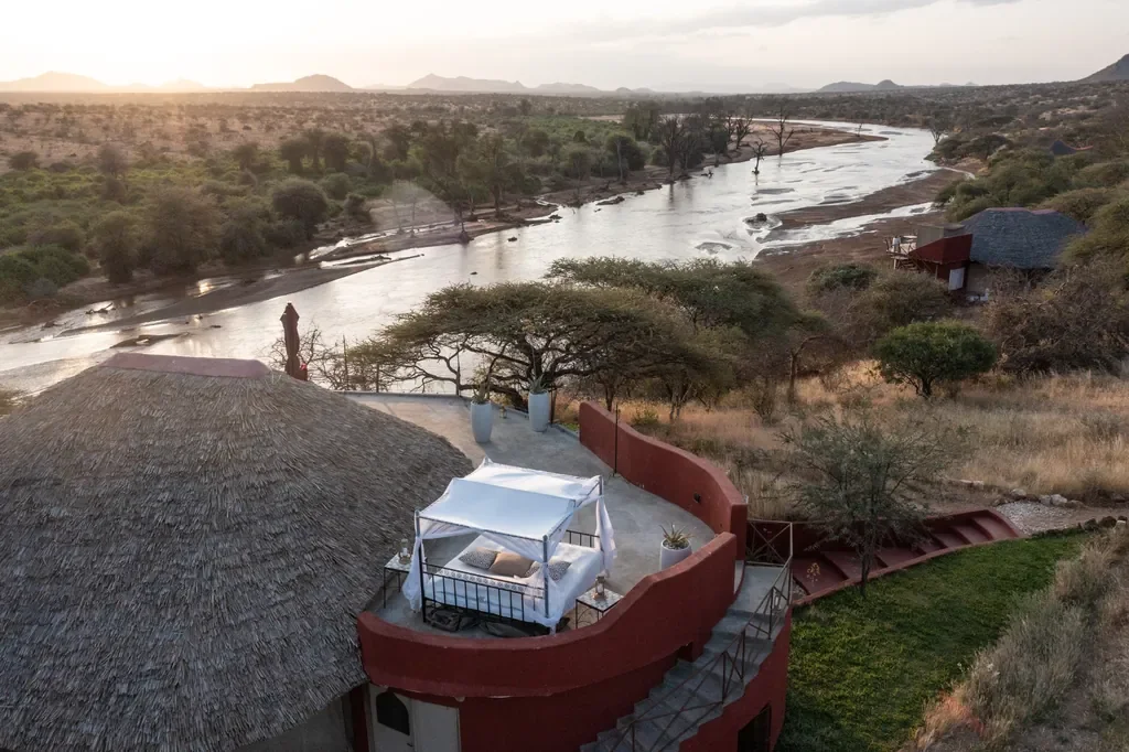 Star-bed terrace at Sasaab above the Ewaso Nyiro River at sunrise, Samburu National Reserve, Kenya