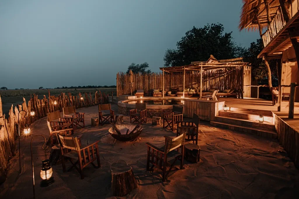 Firelit boma and circular pool at night, Nyamatusi Mahogany, Mana Pools, Zimbabwe