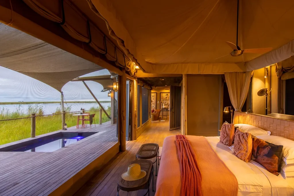 DumaTau tented suite with deck and private plunge pool overlooking the wetlands of the Linyanti