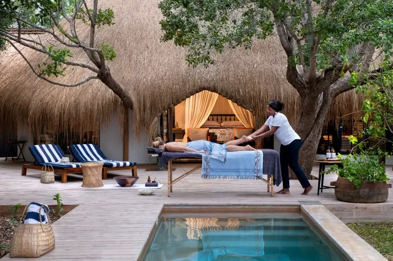 in‑room spa massage beside private plunge pool – andBeyond Benguerra Island, Mozambique