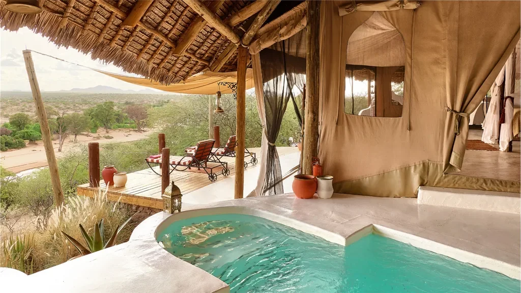 Suite plunge pool at Sasaab with vast Samburu views and shaded daybeds, Kenya