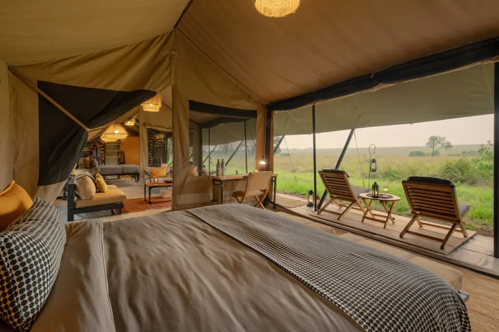Family tent double room at Ubuntu Migration Camp with open savannah views across the Serengeti in Tanzania