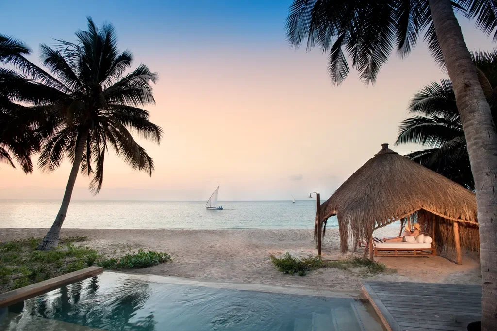 Benguerra Island Cabana pool and beach with guest – andBeyond Benguerra Island, Mozambique