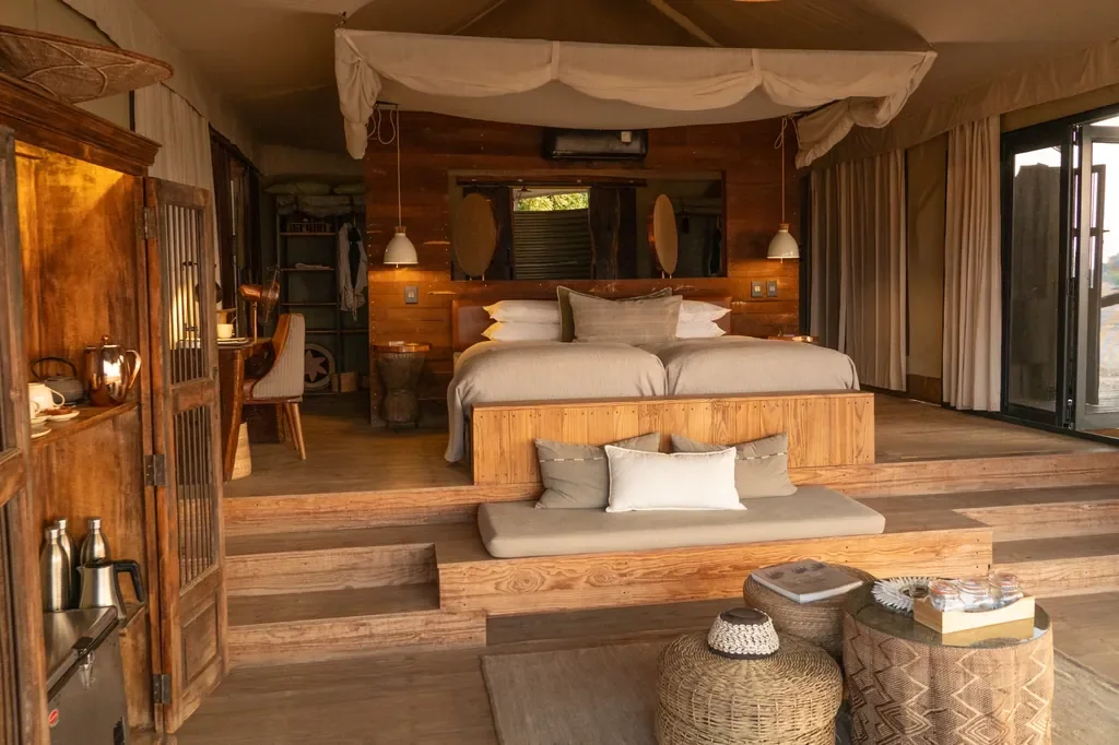 Warm, natural suite interior at Nyamatusi Mahogany, Mana Pools, Zimbabwe