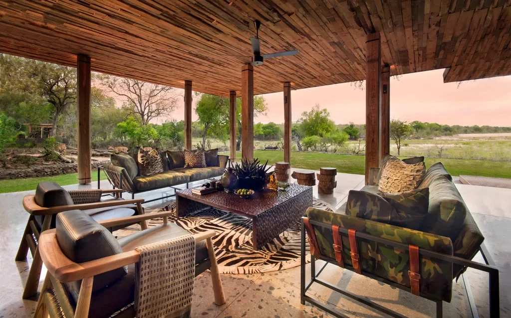 Covered terrace living area with panoramic Sand River views at Tengile River Lodge
