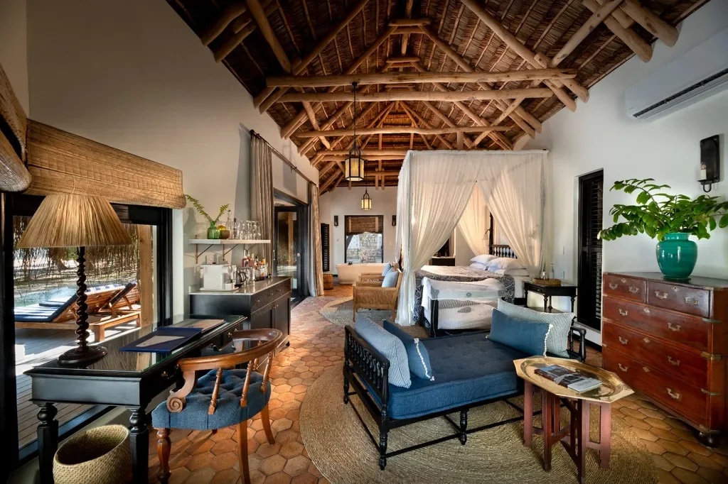 Casinha bedroom with child cot setup – andBeyond Benguerra Island, Mozambique