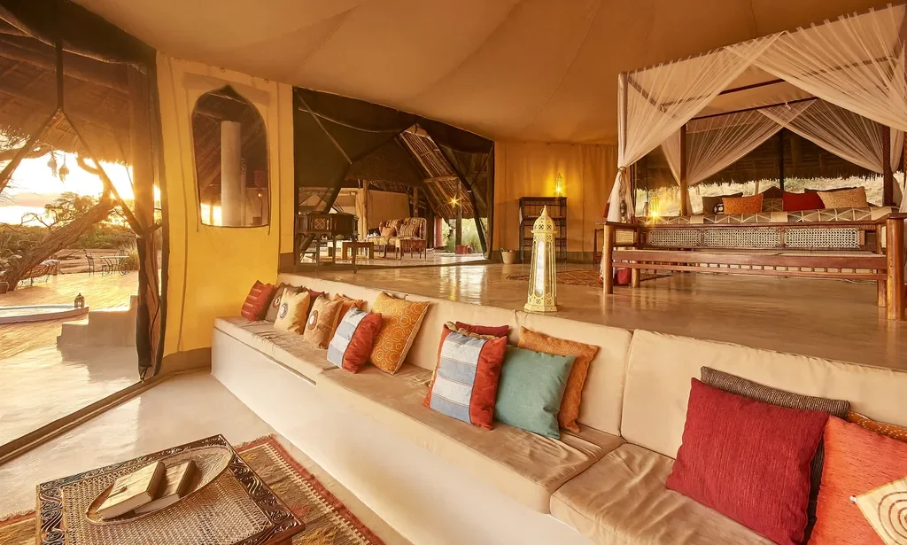 Luxury tented suite at Sasaab with sunset views over the Ewaso Nyiro River, Samburu