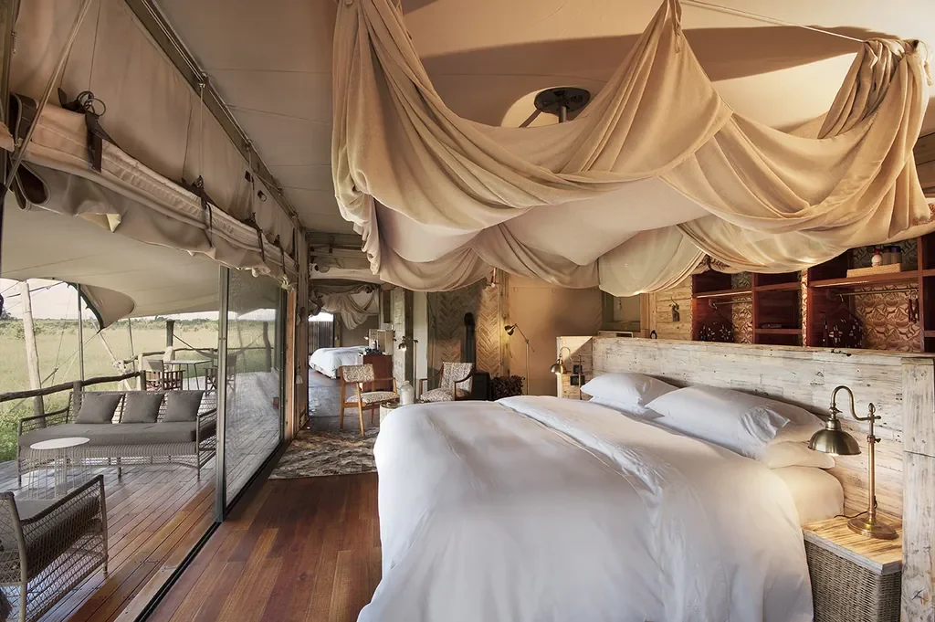 Expansive family tent with veranda seating and canvas walls, Somalisa Acacia Zimbabwe