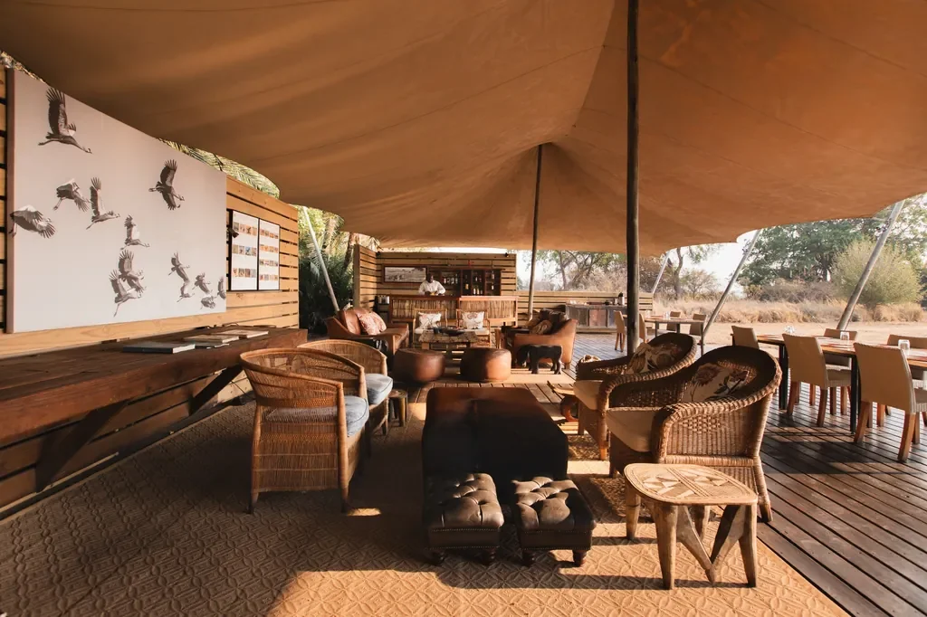 Open-air lounge and dining tent at Busanga Bush Camp, Kafue National Park Zambia safari camp design