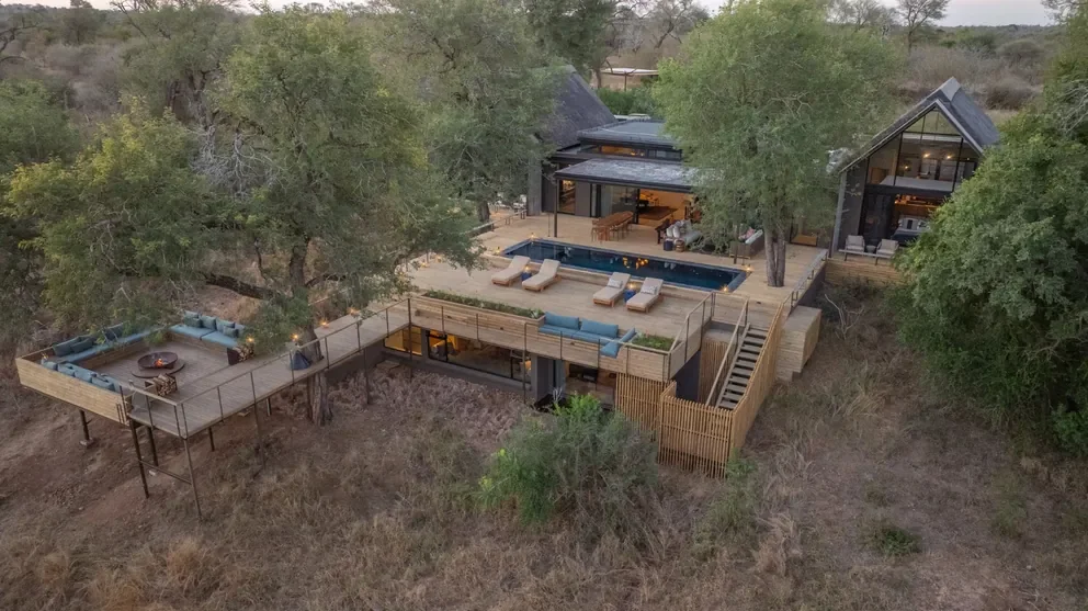 Aerial view of Lion Sands Ivory Lodge, Sabi Sand, Greater Kruger, South Africa on the banks of the Sabie River, showing private villas set among riverine bushveld