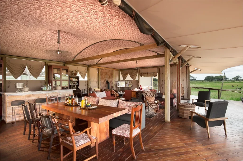 Open-plan dining, bar and lounge under canvas at Somalisa Acacia, Hwange Zimbabwe