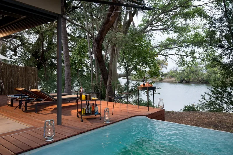 Private deck and plunge pool overlooking the Zambezi at Thorntree River Lodge, Zambia