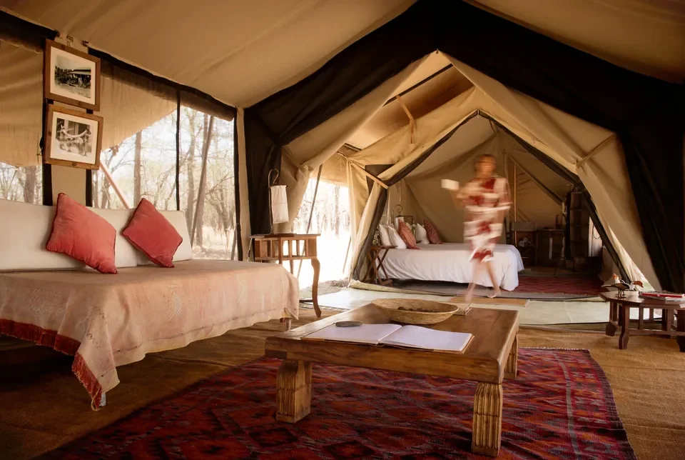 Warm tented lounge and bedroom interior, Serian's Serengeti South, Southern Serengeti, Tanzania