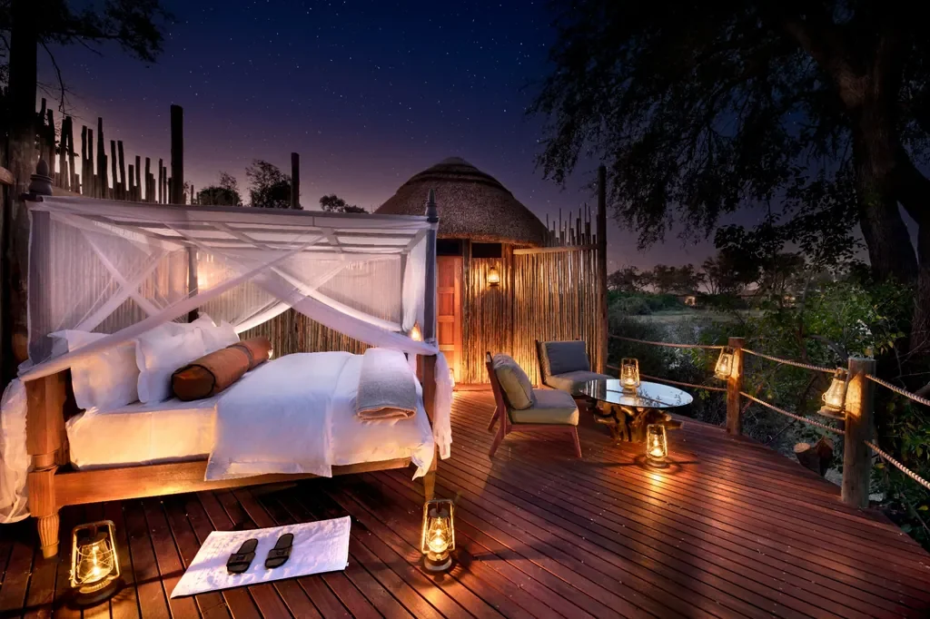Star bed deck at Atzaro Okavango Camp under a sky of stars, Okavango Delta Botswana