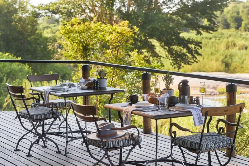 Breakfast on the riverfront deck at Lion Sands Tinga Lodge overlooking the Sabie River, Kruger National Park