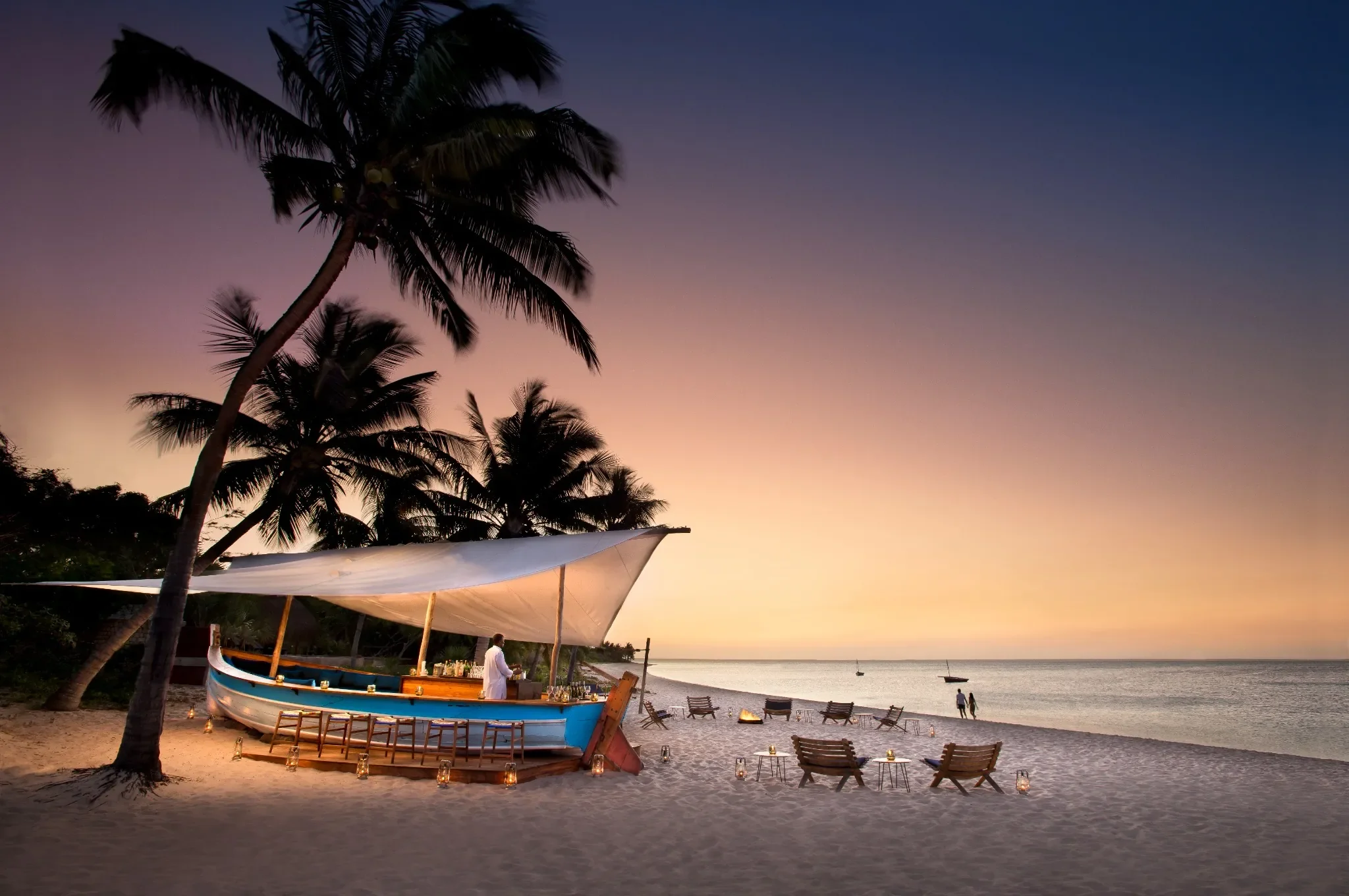 nomara-mozambique-benguerra-dhow-beach-bar-twilight-2560.webp