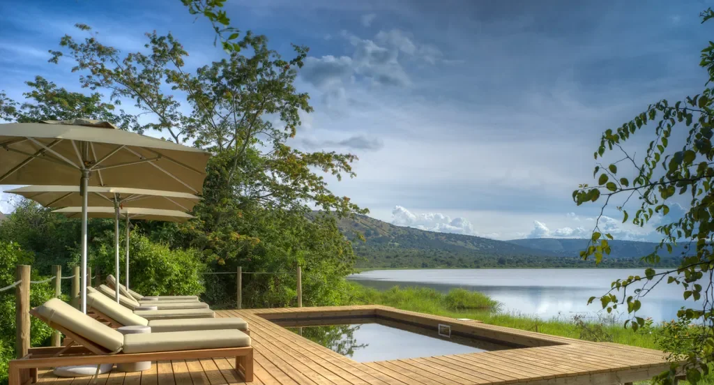 Magashi Camp swimming pool deck overlooking Lake Rwanyakazinga, Akagera Rwanda