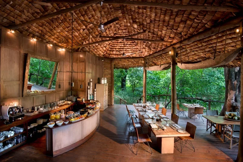 Lake Manyara Tree Lodge, Tanzania – treetop interactive kitchen and open‑air dining room