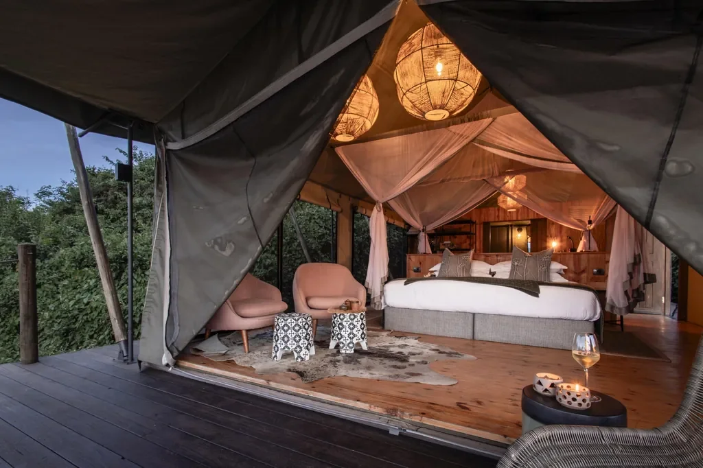 Open front luxury tent at Magashi Camp, lake view in Akagera National Park Rwanda