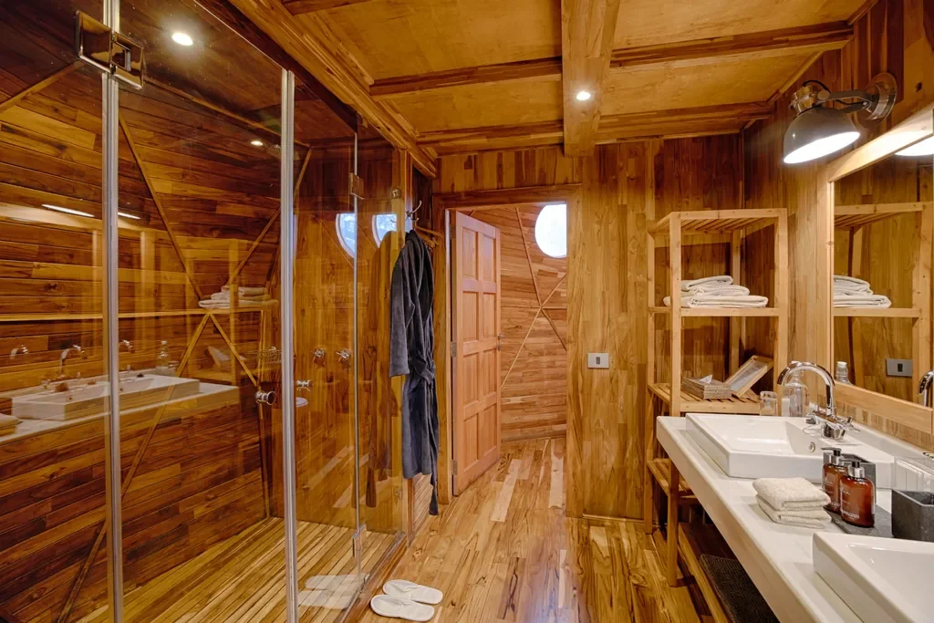 Spacious en suite bathroom with double vanity and walk in shower at The Highlands, Ngorongoro