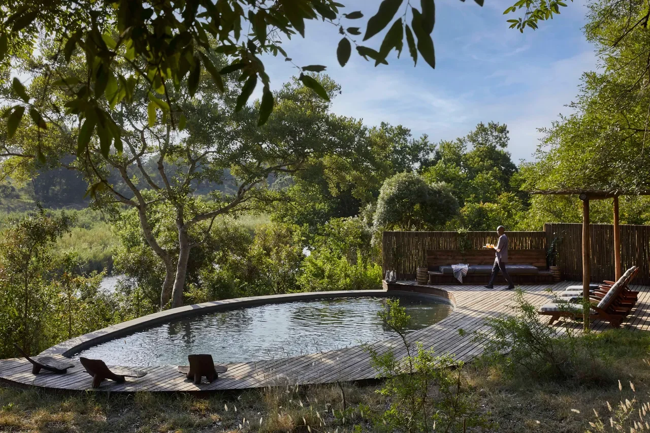 Poolside service at Lion Sands Tinga Lodge beside the Sabie River, Kruger National Park