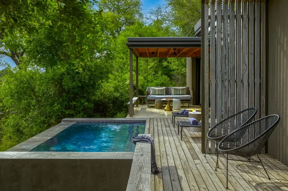 Lion Sands Ivory Lodge, Sabi Sand, Greater Kruger, South Africa — contemporary safari lodge architecture with river and bush views