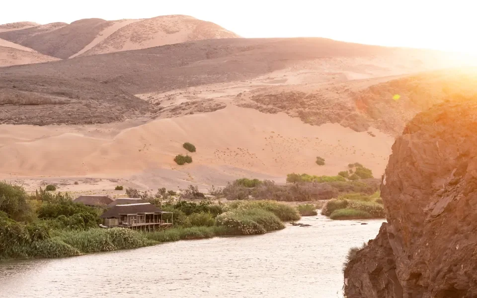 nomara-kunene-namibia-kunene-river-and-sand-dunes-w960.webp